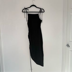 H&M black dress worn once. Size small. Side ruching.